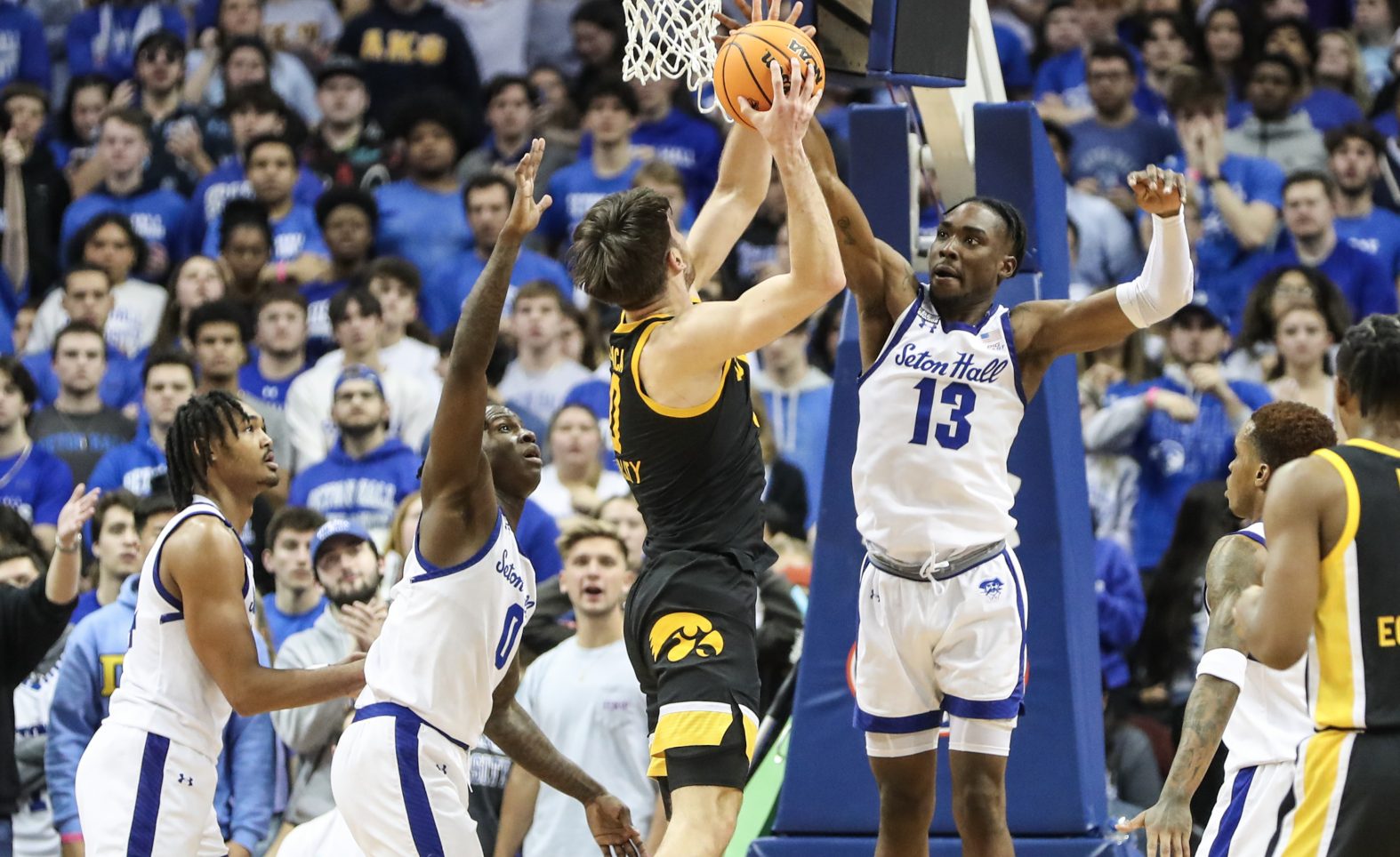 Two Guys Named Chris: Iowa hoops wins at Seton Hall, college football weekend preview