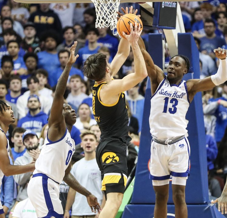 Two Guys Named Chris: Iowa hoops wins at Seton Hall, college football weekend preview